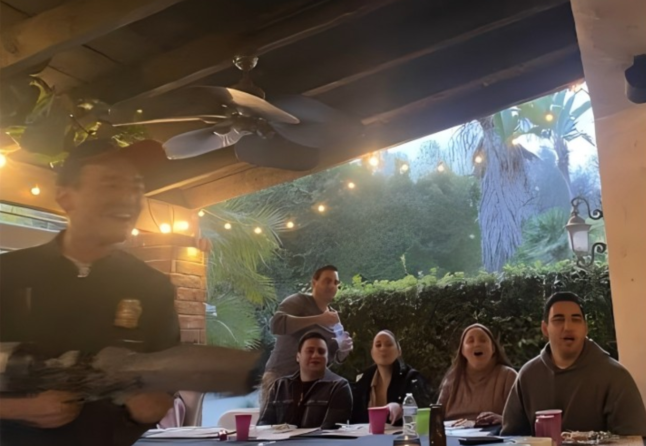 A tiny laptop in the palm of a hand