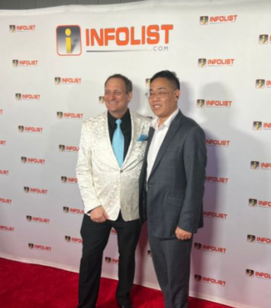 A tiny laptop in the palm of a hand