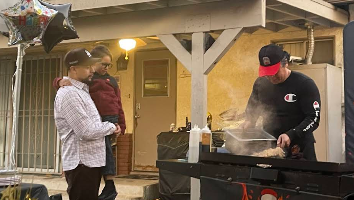 A tiny laptop in the palm of a hand