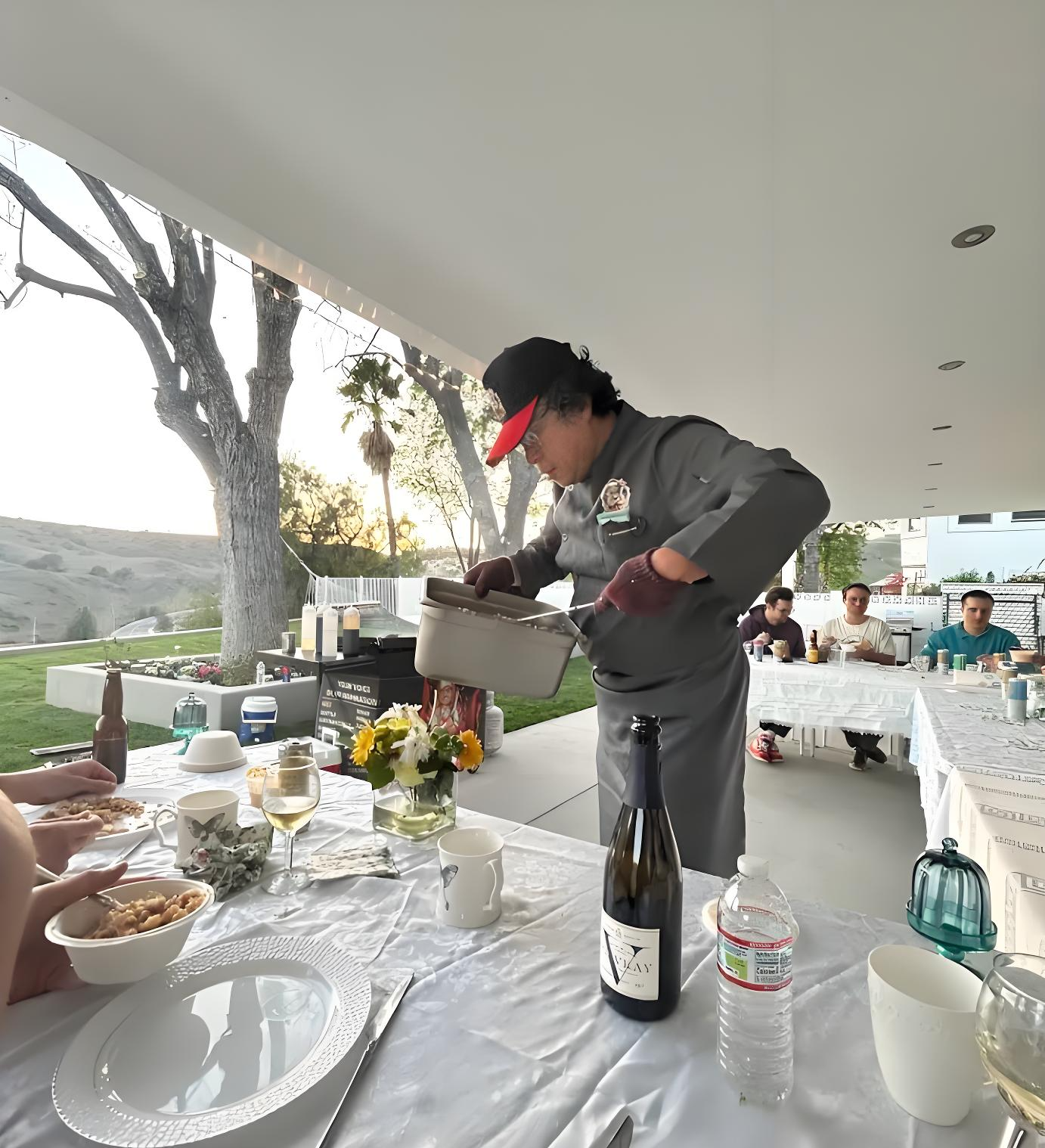 A tiny laptop in the palm of a hand