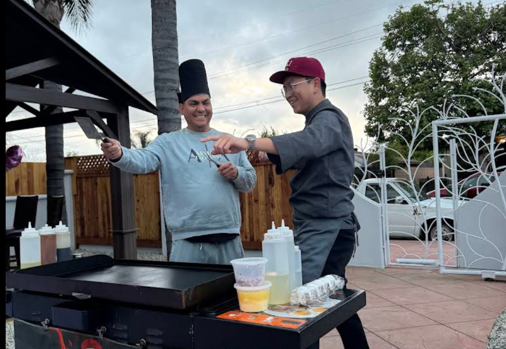 A tiny laptop in the palm of a hand