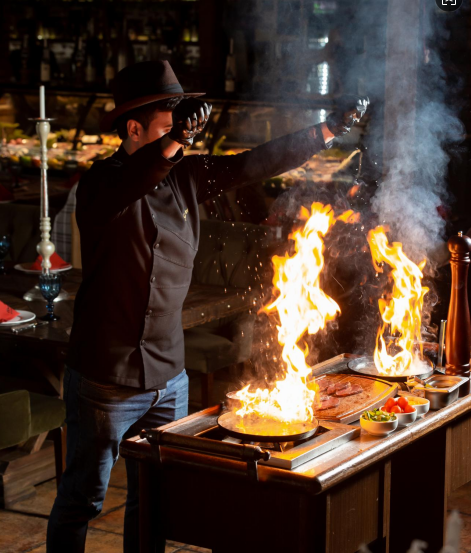 A tiny laptop in the palm of a hand