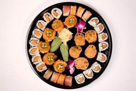 A tiny laptop in the palm of a hand